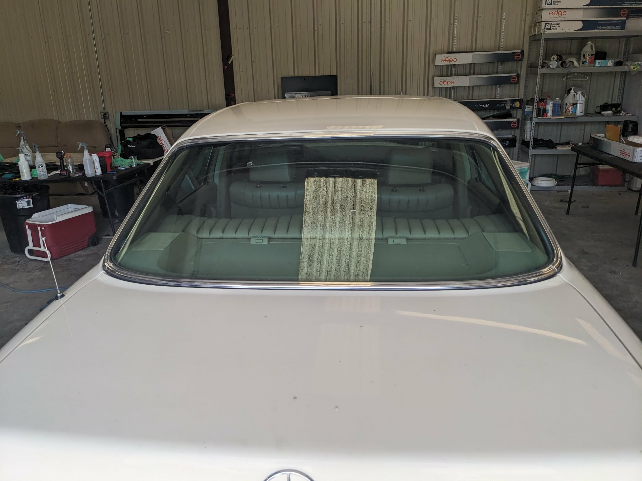 Mercedes S-Class rear windshield before tint, clear glass